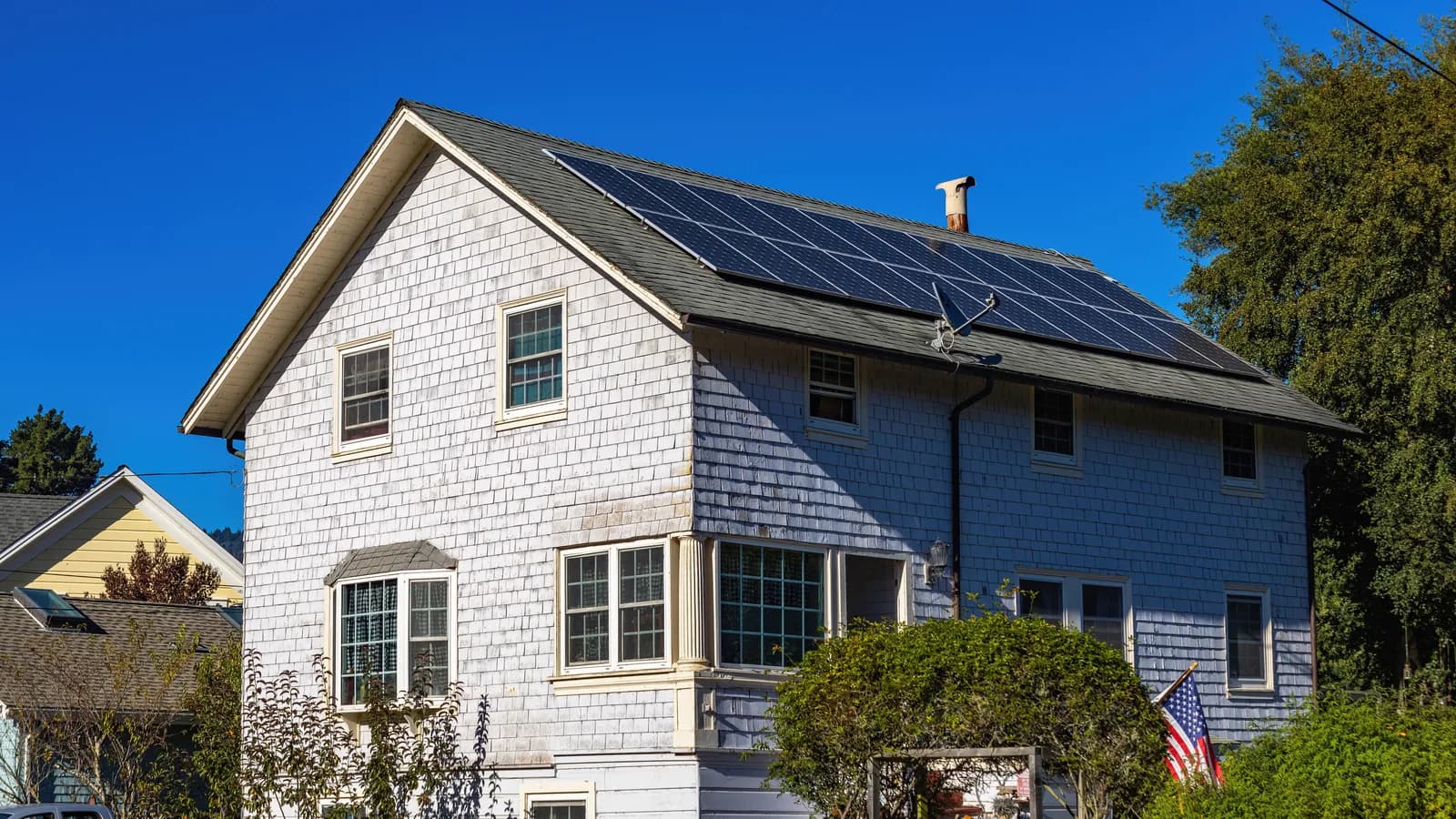 Suburban house fitted with rooftop solar panels