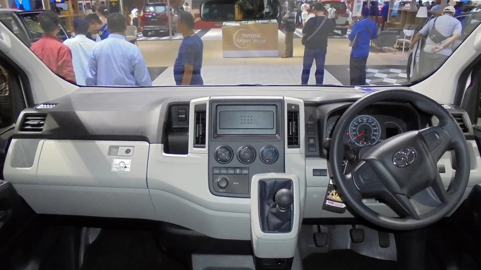 Dashboard and steering wheel of a current Toyota HiAce with a centre-mounted screen